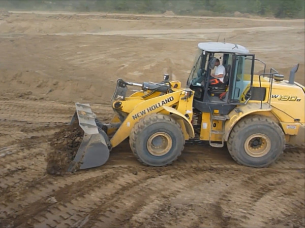 New Holland (Нью Холланд) Фронтальний навантажувач New Holland W190B (24 години)