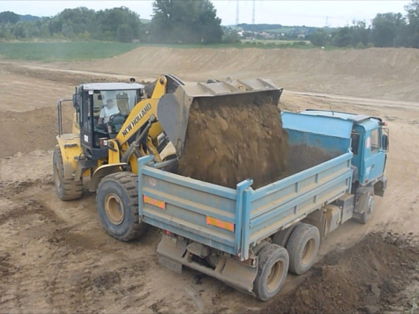 New Holland (Нью Холланд) Фронтальний навантажувач New Holland W190B (24 години)