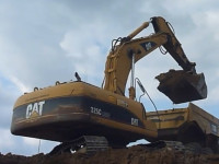 Гусеничный экскаватор Caterpillar 325C LN