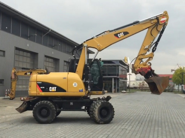  Повноповоротний екскаватор CAT M313C