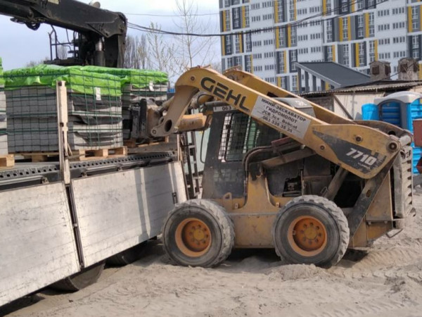 Погрузчик с вилами GEHL 7710