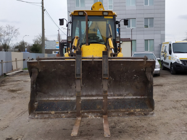 Вилочный погрузчик  JCB 3CX с экскаваторным ковшом